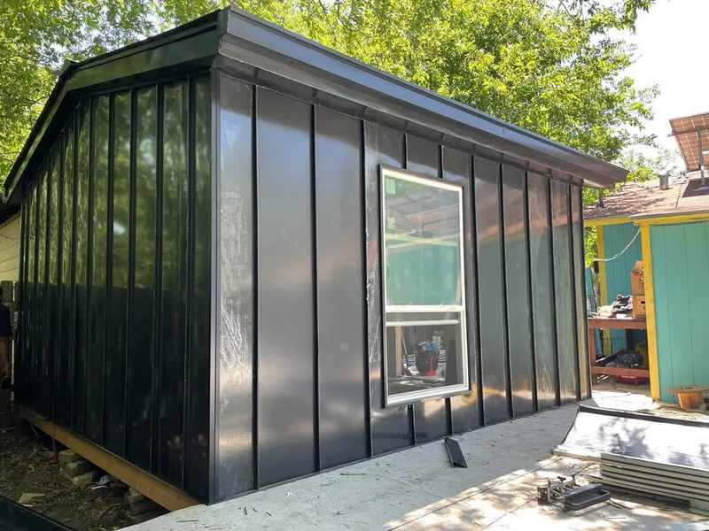 Black standing seam metal wall panels for Roof Inspection in Cullowhee