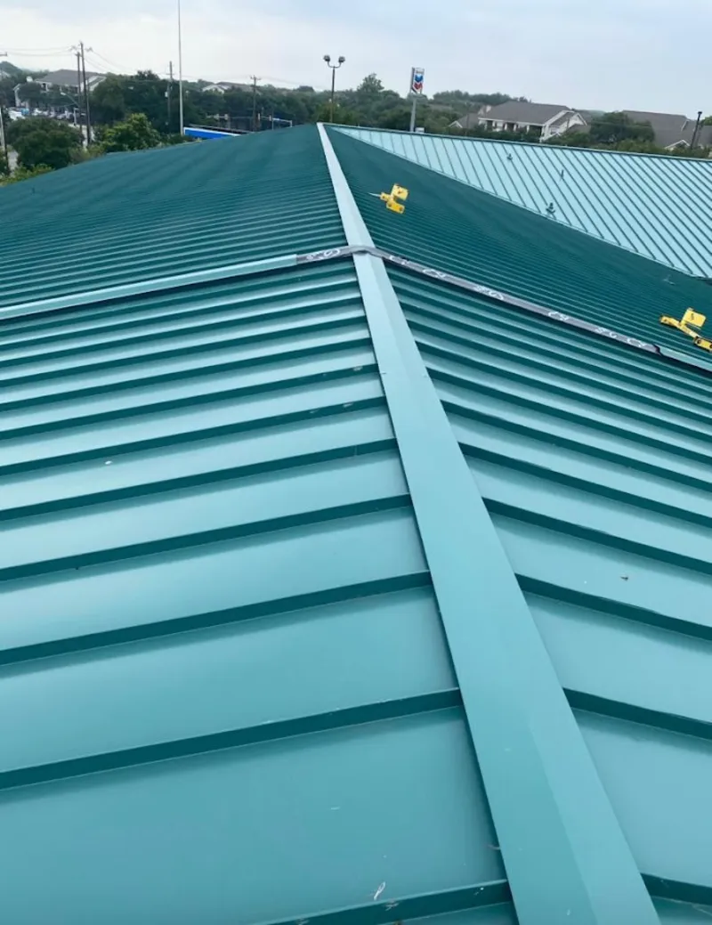 Green commercial metal roof ridge and valley for Metal Roof Repair in Cullowhee